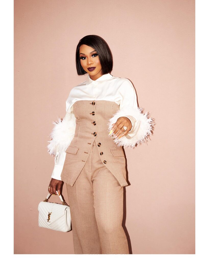 picture of Sarah Jakes Roberts holding a structured bag