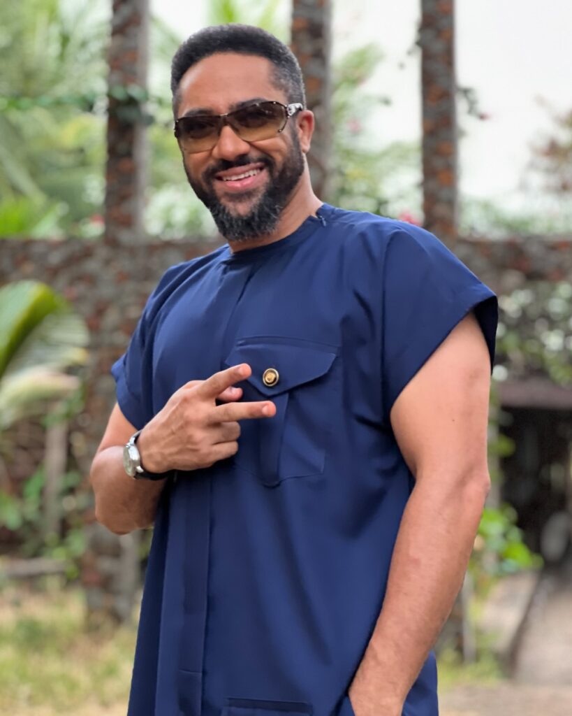 Picture of Ghanaian popular actor Majid Michelle in a kaftan, rocking Ghanaian fashion style