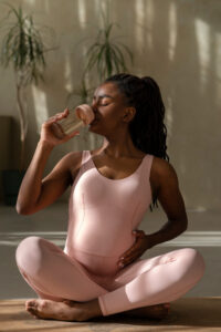 A pregnant woman in a gym — pregnancy journey in Ghana.