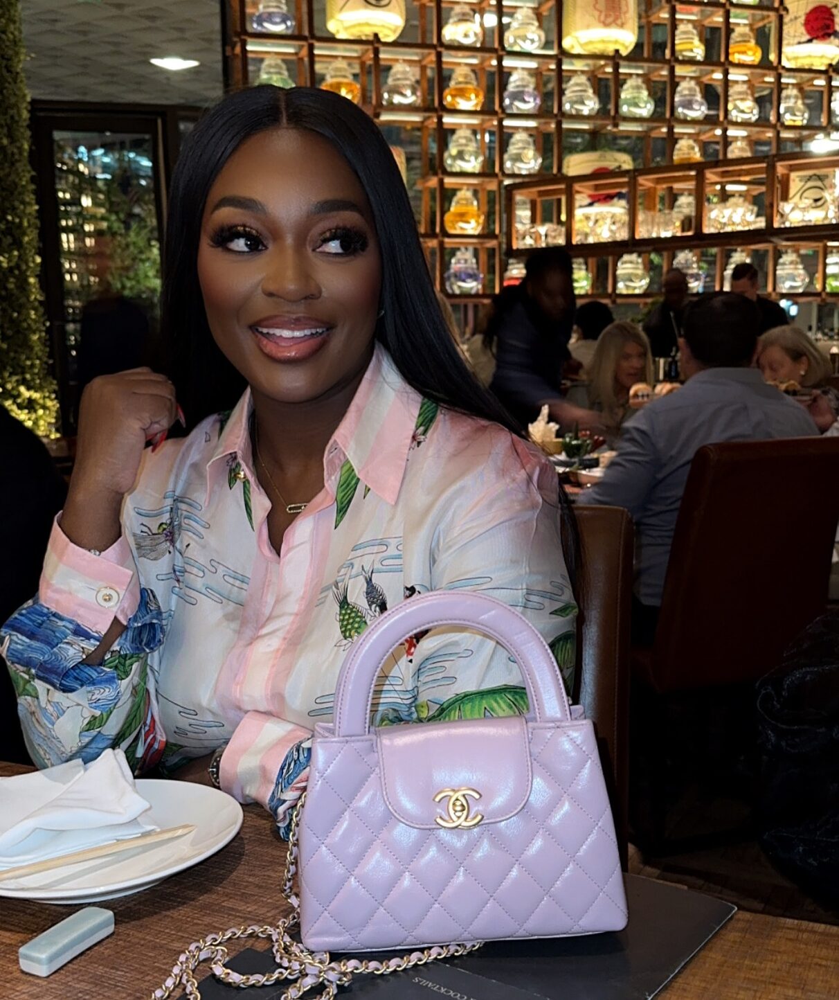 A picture of Ghanaian actress Jackie Appiah in a restaurant. This is Jackie Appiah's lifestyle habits.