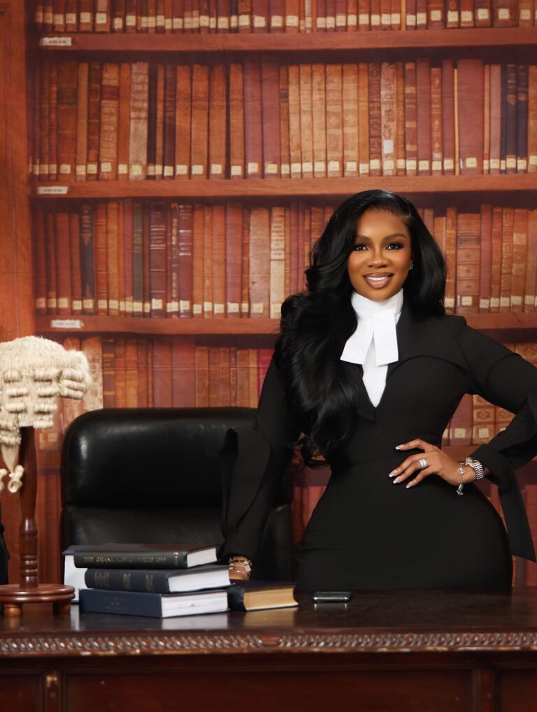 Picture of Serwaa Amihere in a black long-sleeved dress.