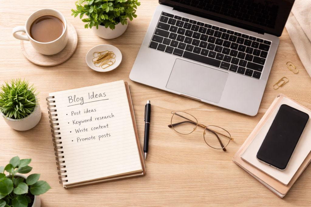 Blogging essentials laid out on a desk, showing how to start a blog in 2026 and make money from home.