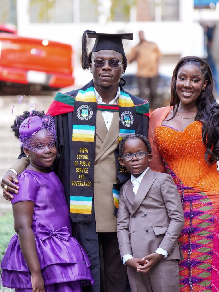 A picture of Ghanaian celebrity Stonebwoy and his family celebrating his academic milestone together