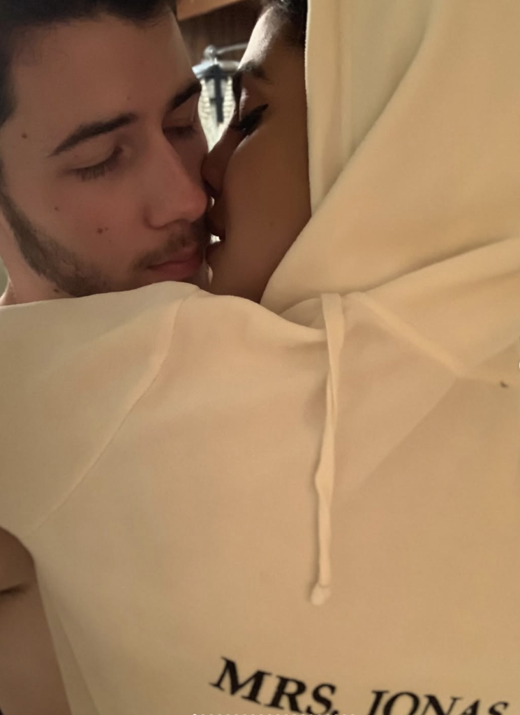 Priyanka Chopra and Nick Jonas sharing an intimate moment close together