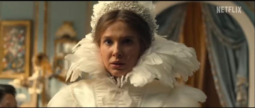Enola Holmes wears an elegant white wedding gown